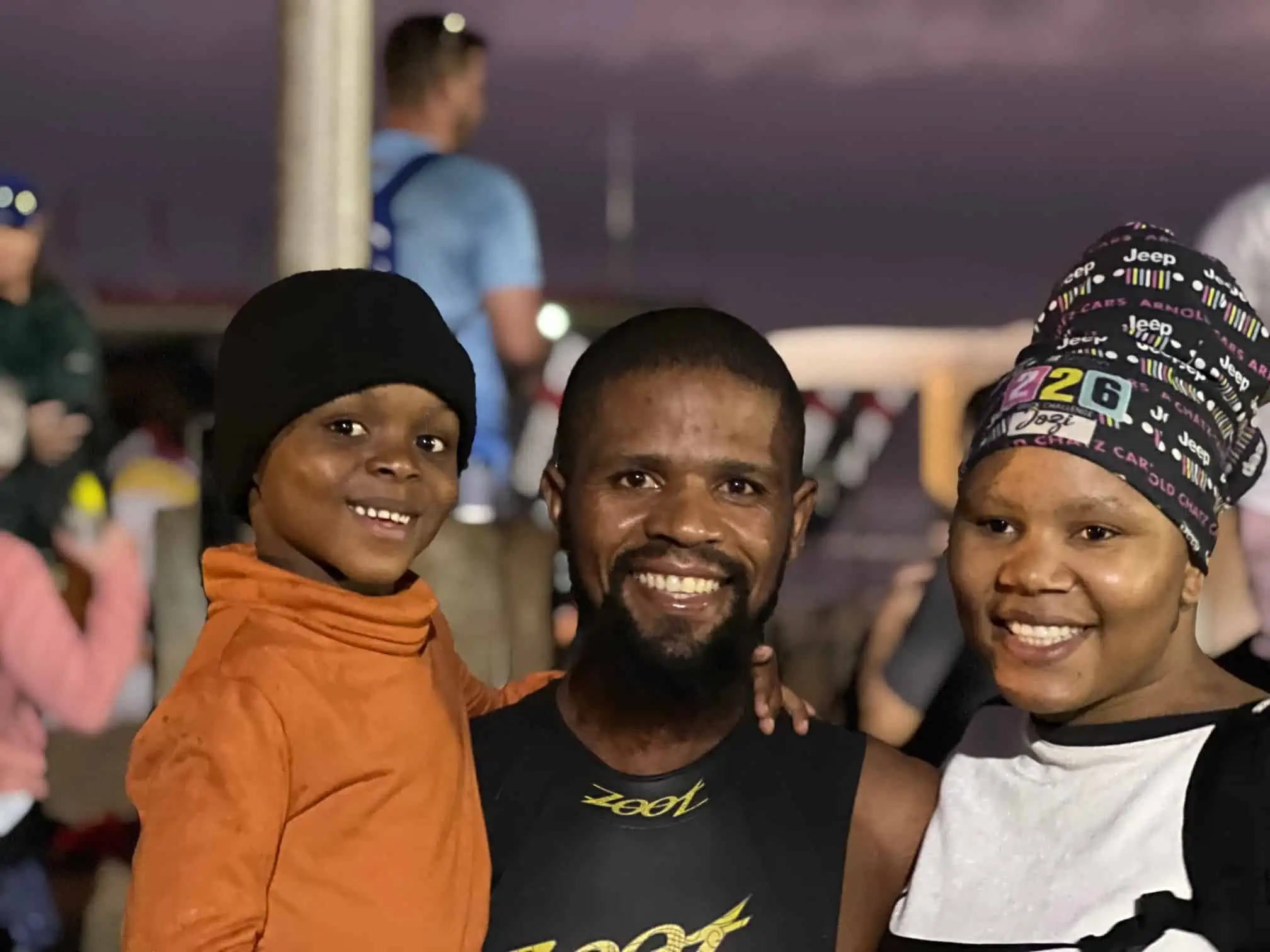 Sanele with family after a race