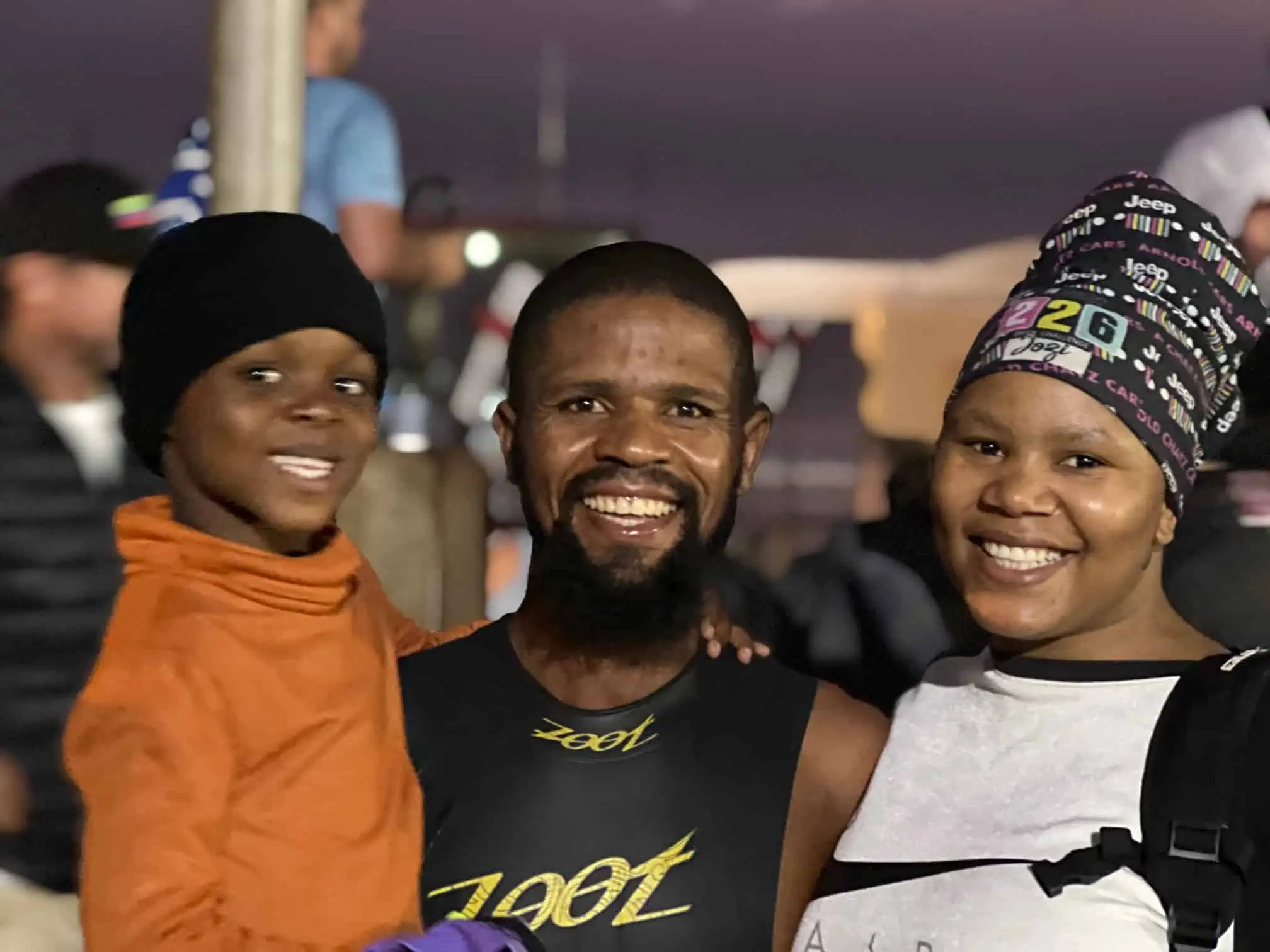 Sanele with supporters after a race